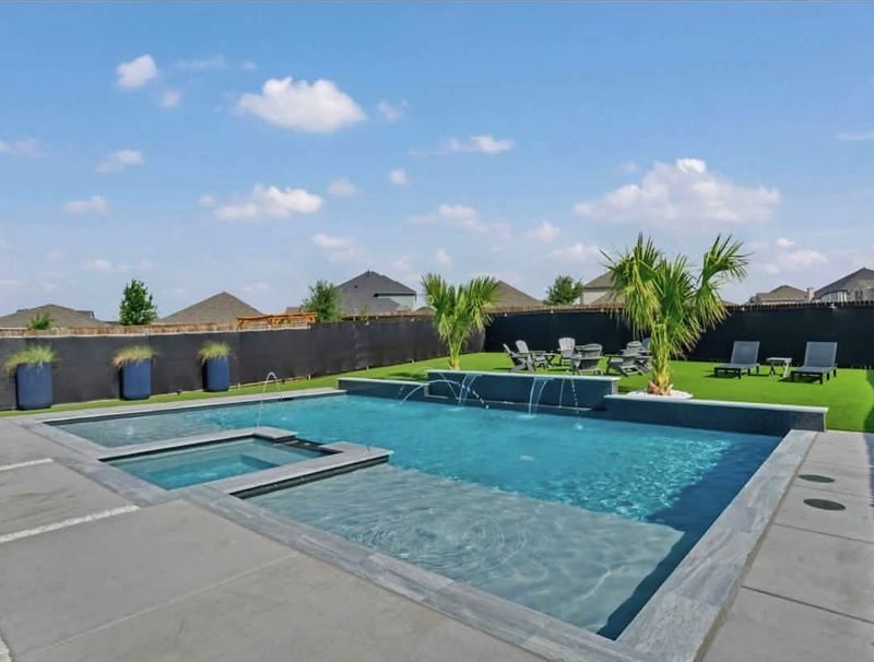 Finished pool with tanning ledge and spa